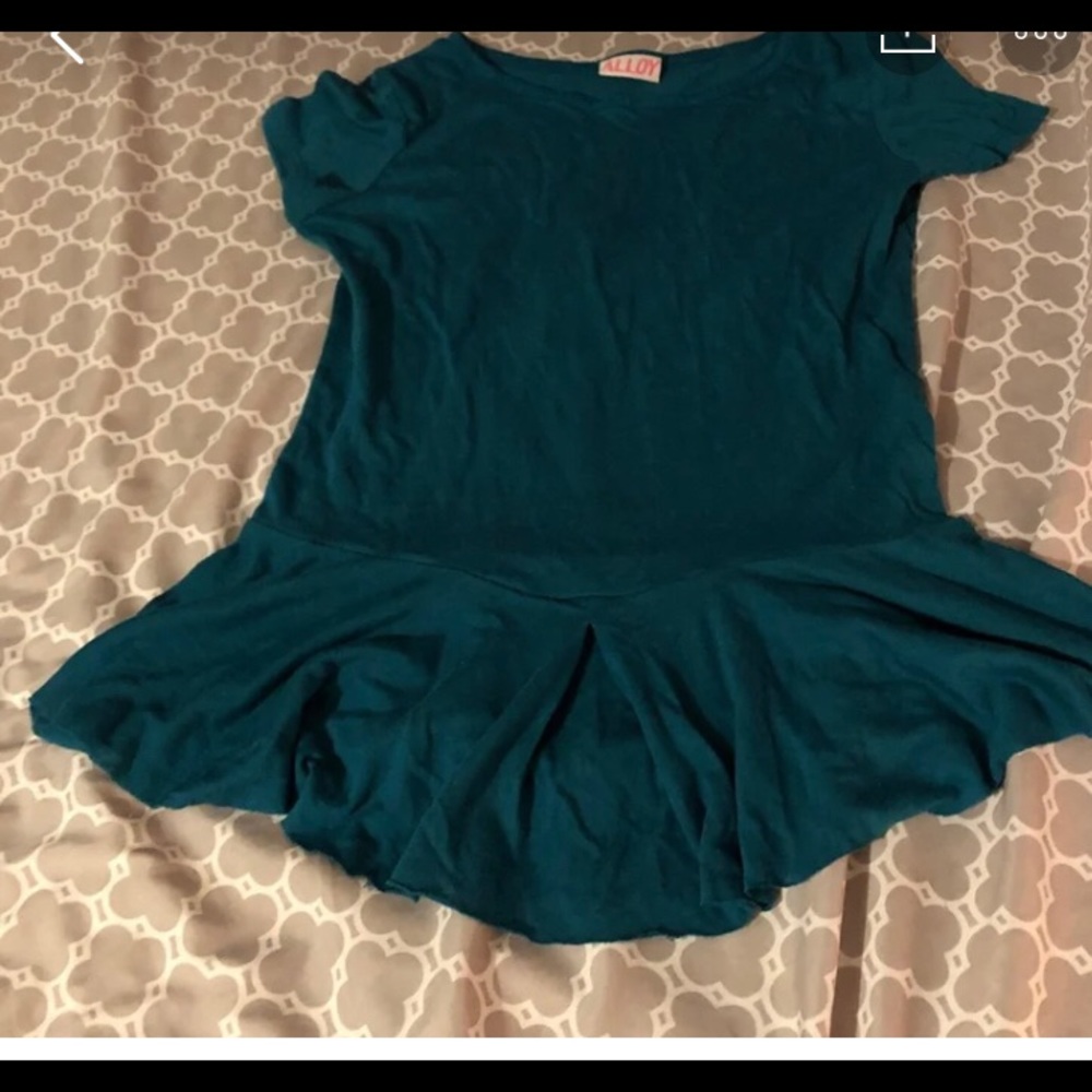 Teal shirt with ruffles around the bottom